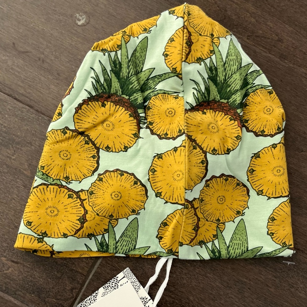 NWT Kate Quinn pineapple print hat. Size 12-18 months. Beanie style
